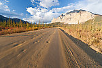 This is one of my favorite pictures -- I think it really captures the character of the place.  This is the view from the south of Sukakpak Mountain, a prominent landmark on the south side of the Brooks Range.  The Dalton Highway winds in an arc around Sukapak, providing very different views from different angles. From Dalton Highway in Alaska.