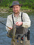 My first good-sized grayling of the year, and the biggest I've seen in this creek, about 15-16 inches. From Nome Creek in Alaska.