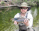 This old grayling had some serious battle scars on its dorsal fin, something I've never seen before catching many hundreds of fish. From the Chena River in Alaska.