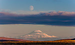 Moonrise over Mt Sanford. An unusually clear view of this mountain from 90 miles away on the Denali Highway From Denali Highway in Alaska.