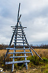 Tower at eskimo cabin for watching for caribou on distant hills From the Selawik River in Alaska.