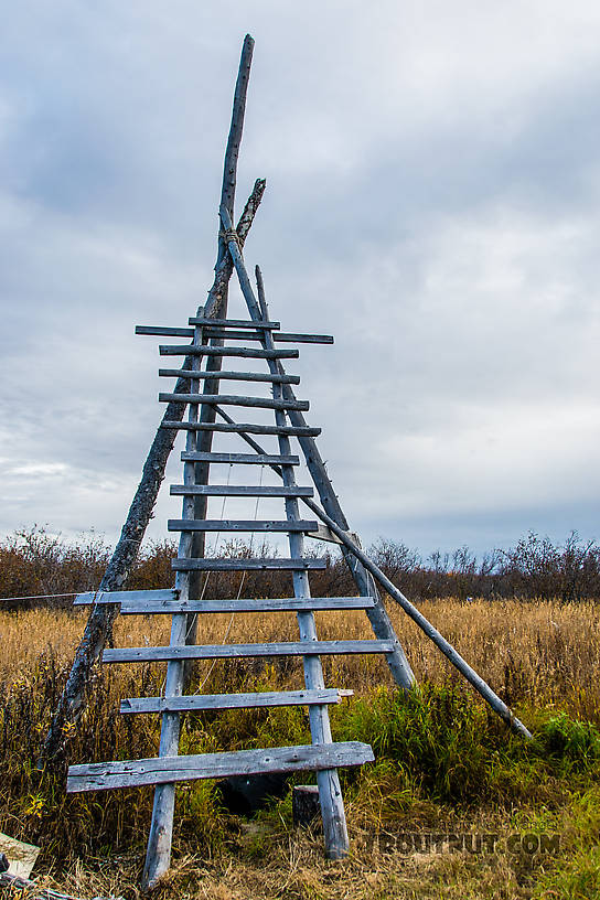 Tower at eskimo cabin for watching for caribou on distant hills From the Selawik River in Alaska.