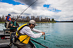 Unhooking another trout for Lena From the Kenai River in Alaska.