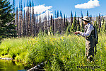 My wife Lena fishing a nice mountain meadow From Mystery Creek # 199 in Washington.