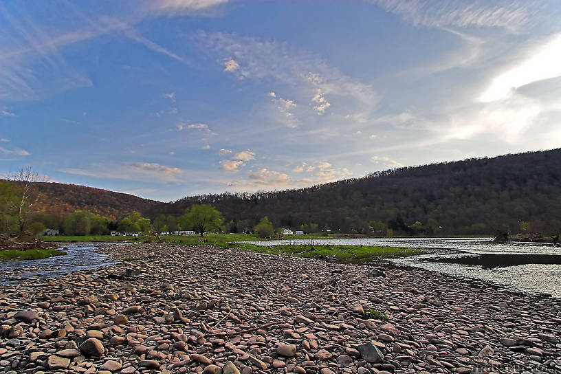 A tributary on the left approaches the large Catskill river on the right. From the West Branch of the Delaware River in New York.