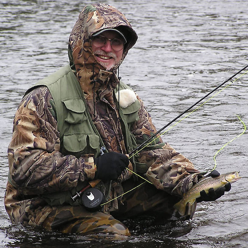 This is my dad's first brown trout on the fly, an 11 incher. From the Namekagon River in Wisconsin.