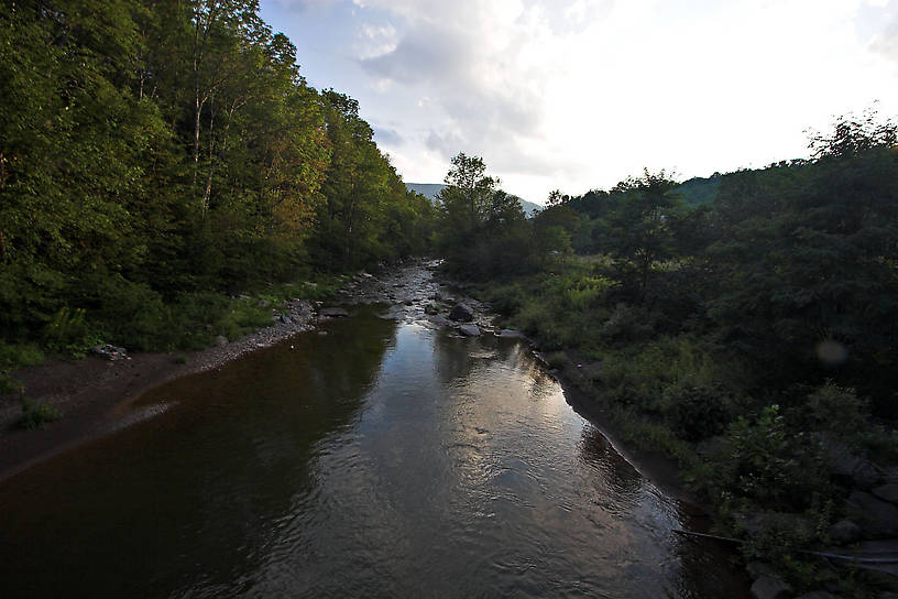 There's a really deep pool below this bridge on a relatively small Catskill stream. From East Kill in New York.