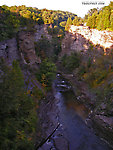 This gorge reportedly holds trout, and I would love to fish for them, although the stream's marginal thermal temperature would likely lead to disappointment.  It's hard to find out because there doesn't seem to be a way to get down there without professional rock-climbing equipment or a helicopter... From Toughannock Creek in New York.