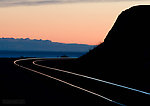 Sunset over the Alaska Railroad tracks along the Turnagain Arm of Cook Inlet, photographed on my drive back home to Fairbanks from the Kenai Peninsula. From Turnagain Arm of Cook Inlet in Alaska.