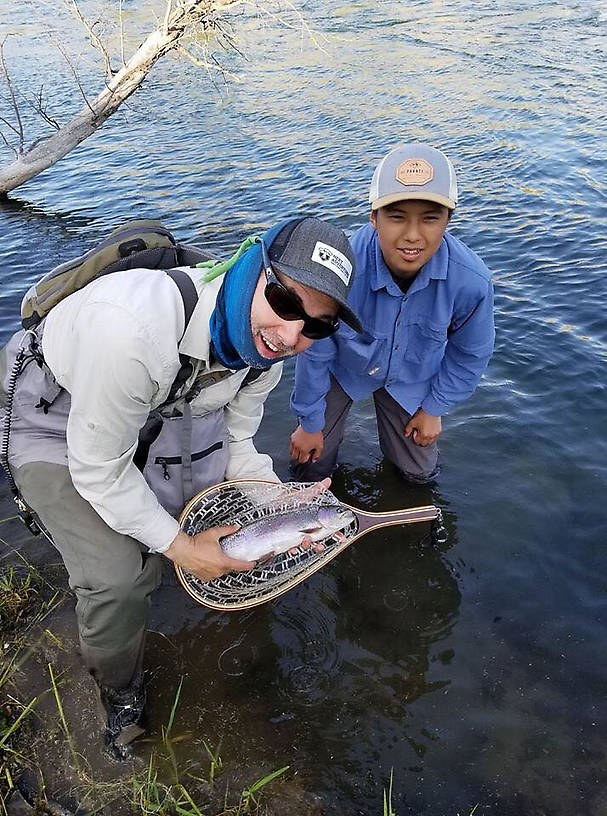 Marv, with Shane, Elke and Alysia's son.  And a beautiful rainbow trout.