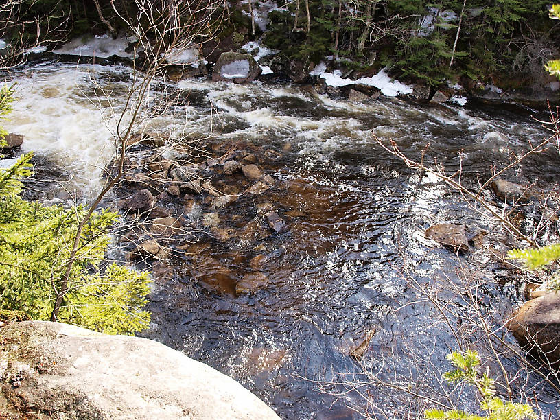 Some slower water aside the main current below the waterfall