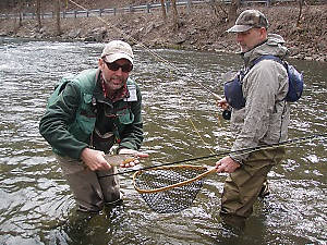 Louis helping Spence land this tiny Brown...