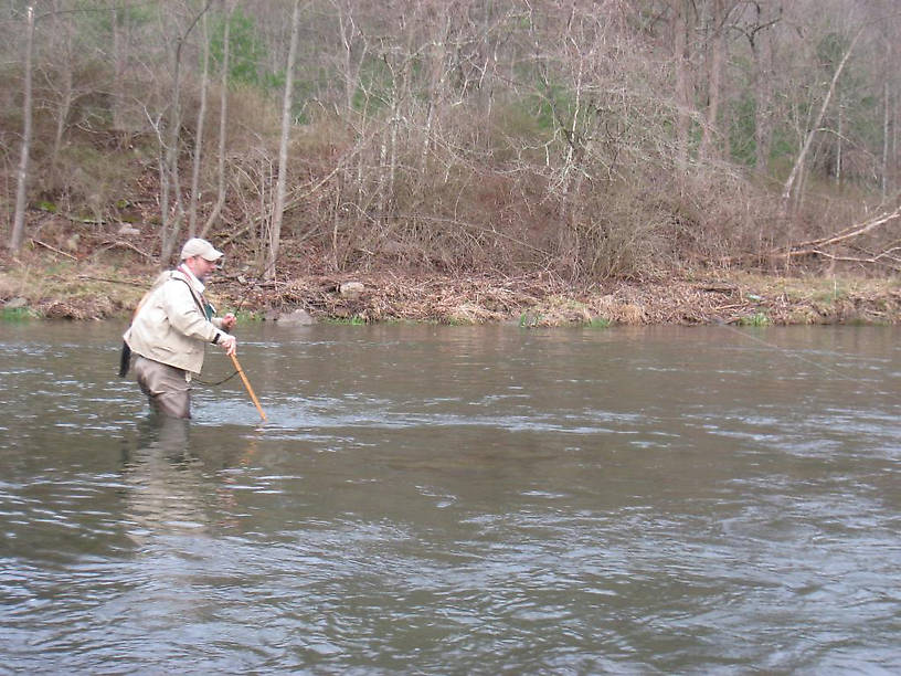 Here I am trying out my new wading staff...I never felt stable the whole afternoon...but who cares...We had fish sucking in Henny's.