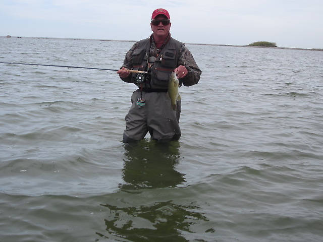 One of our members...I thought I was hard to get off the water..."Just one more cast dear." ;) This fella can fish! 