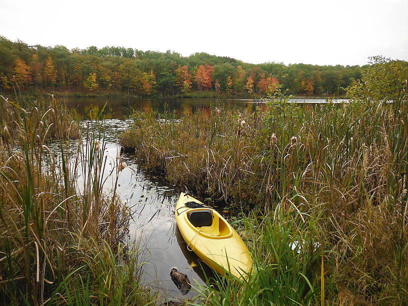 The launch and fall colors at Reid Lake