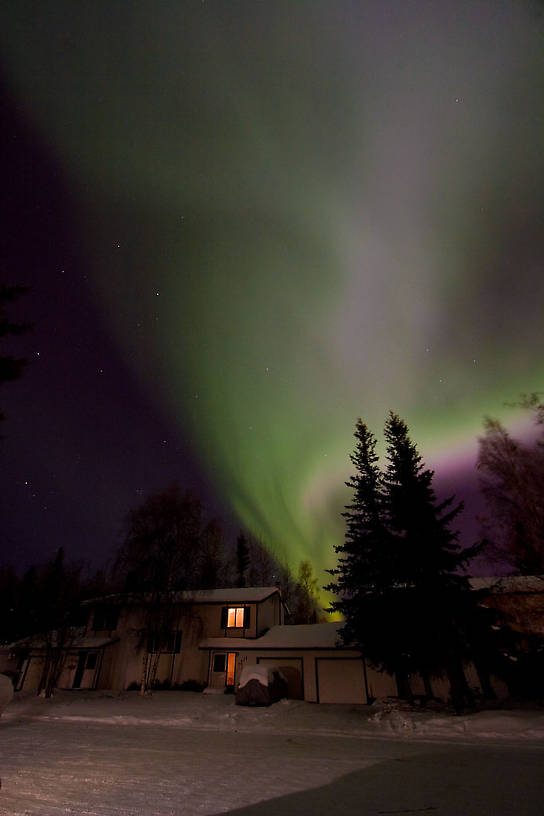 From my driveway.  I wish I'd taken a shorter exposure at higher sensitivity to capture more detail.  This is one in which the colors were moving around so fast that the long exposure blurred out some magnificent patterns.