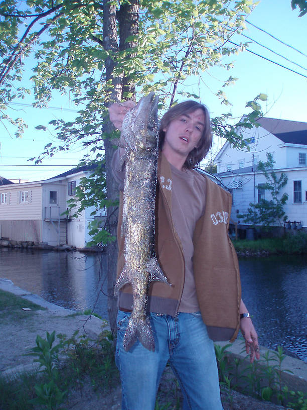 Here he is... 2ft pickerel.  Caught him on an old fake worm with a jighead that i found laying on the ground at a local pond.  The best lures aren't the 7 dollar ones i buy, but the ones i find.