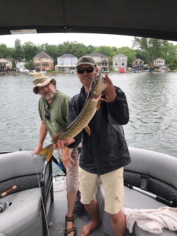 Todd scores a slimy toothy pike! 1st of about 6 for the weekend...