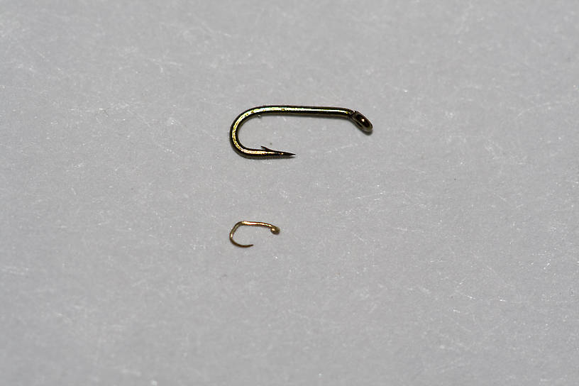 OK, that first pic was a joke.  Here is the actual hook, with a size-26 hook for comparison.